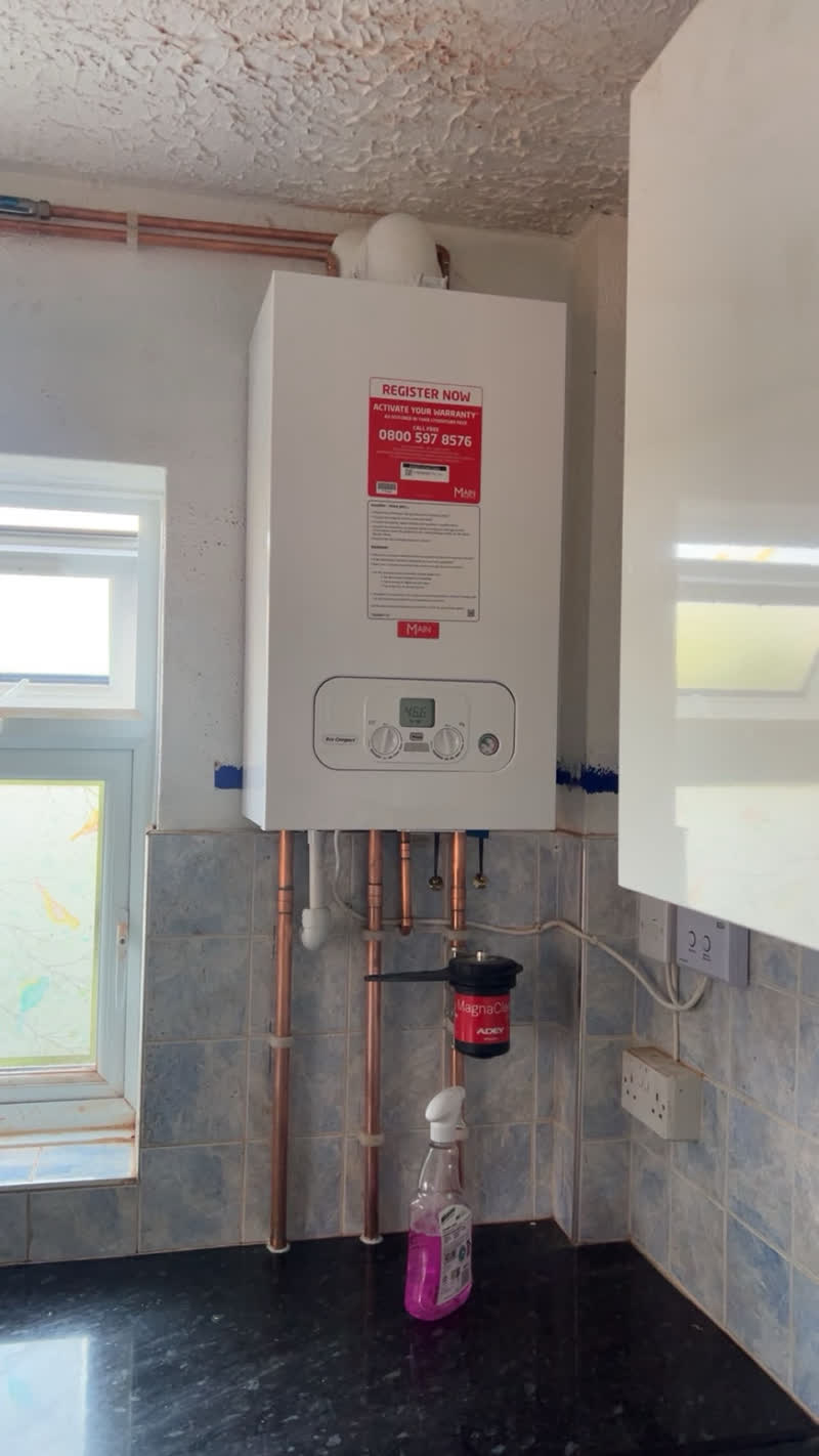 Main Eco Compact boiler installed above a tiled kitchen worktop