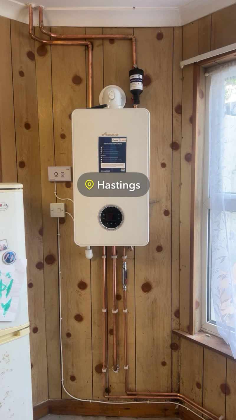 Worcester Bosch boiler installation in a Hastings home with wood panelled wall